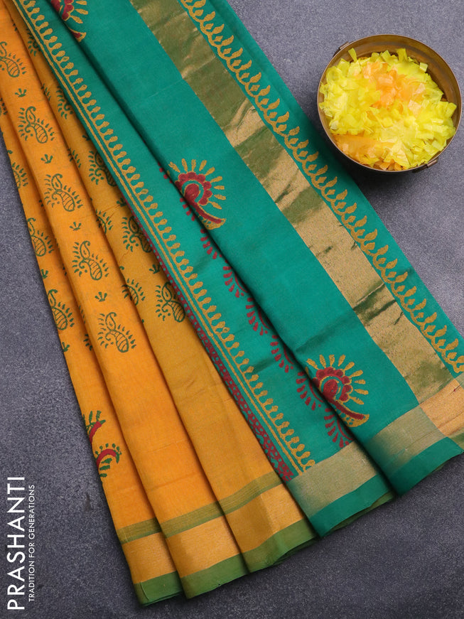 Silk cotton block printed saree mustard yellow and green with allover prints and zari woven border