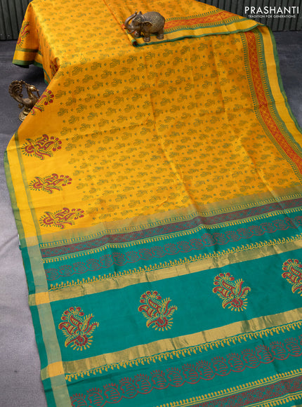 Silk cotton block printed saree mustard yellow and green with allover prints and zari woven border