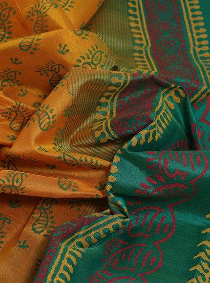 Silk cotton block printed saree mustard yellow and green with allover prints and zari woven border