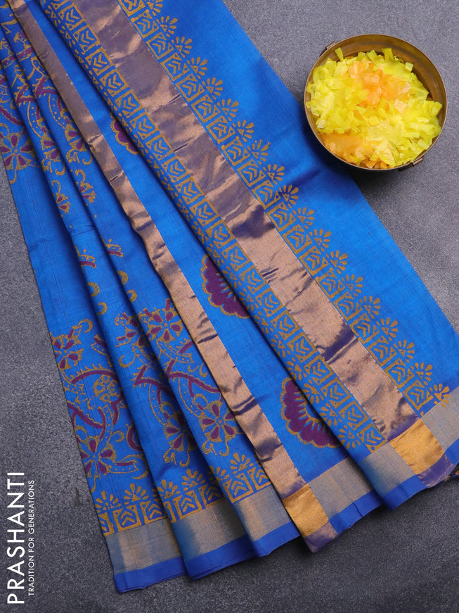 Silk cotton block printed saree blue with allover prints and zari woven border