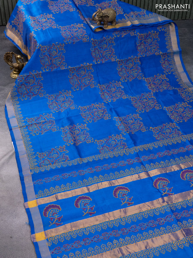 Silk cotton block printed saree blue with allover prints and zari woven border