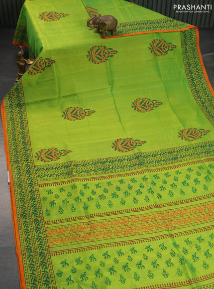 Silk cotton block printed saree light green and orange with butta prints and printed border