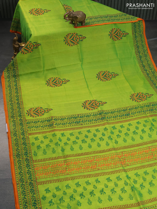 Silk cotton block printed saree light green and orange with butta prints and printed border