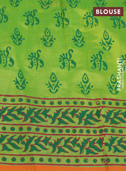 Silk cotton block printed saree light green and orange with butta prints and printed border