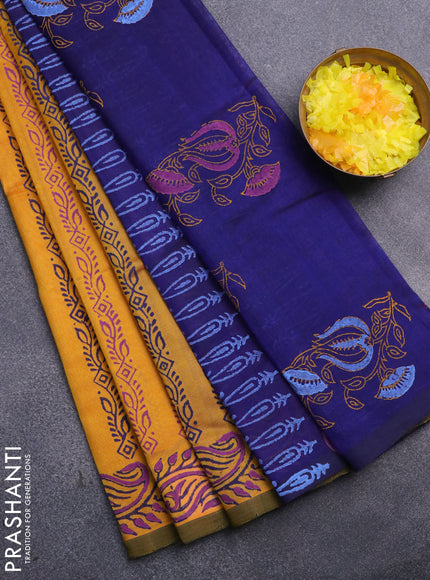 Silk cotton block printed saree mustard yellow and blue with allover prints and printed border