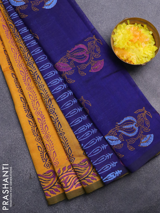 Silk cotton block printed saree mustard yellow and blue with allover prints and printed border