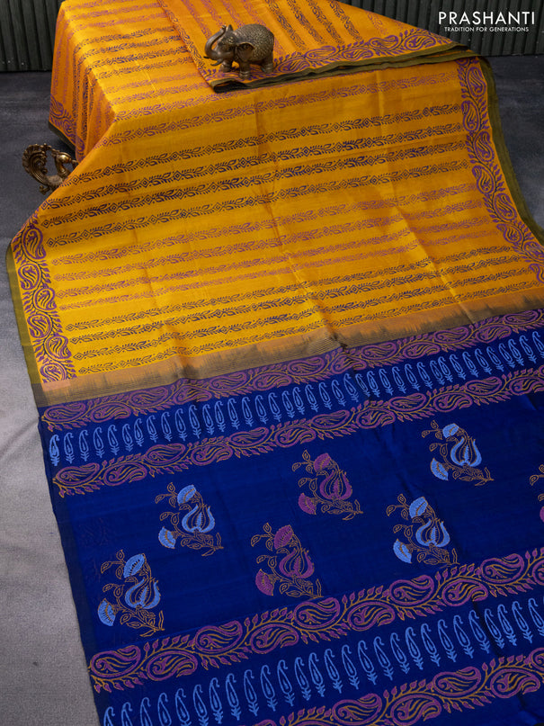 Silk cotton block printed saree mustard yellow and blue with allover prints and printed border