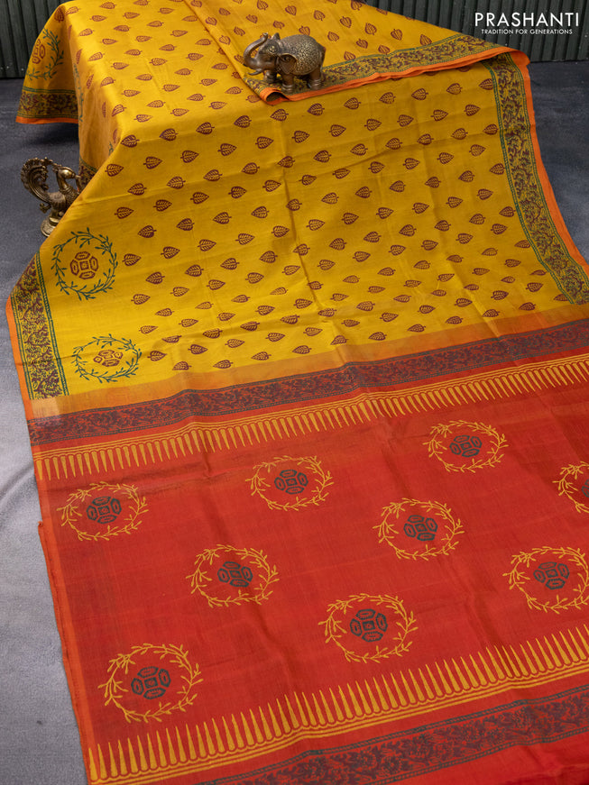 Silk cotton block printed saree mustard shade and rust shade with allover prints and printed border