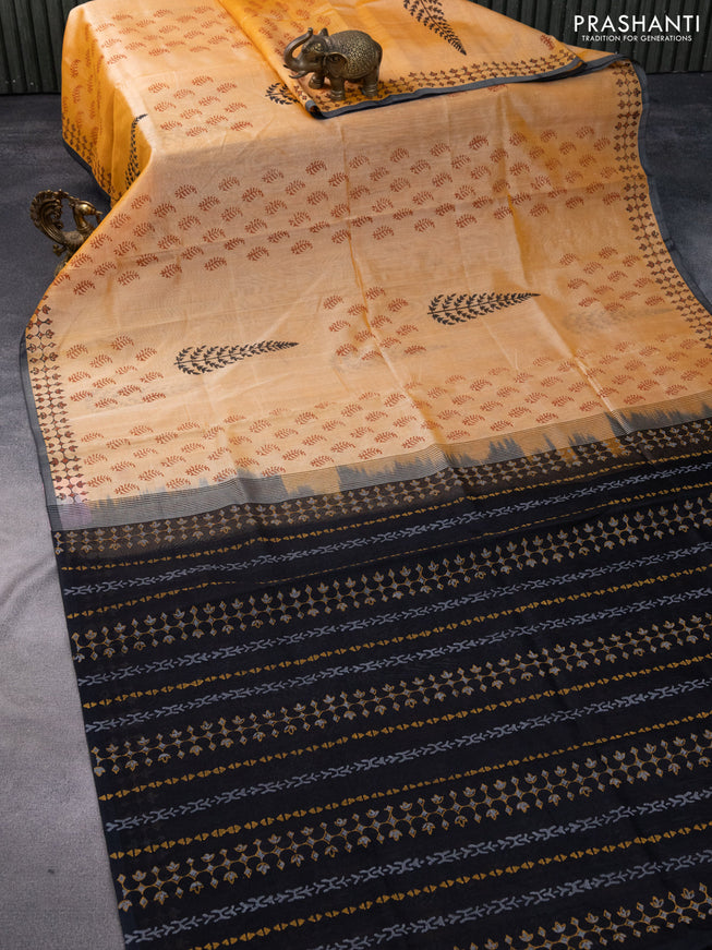 Silk cotton block printed saree pale orange and black with butta prints and printed border