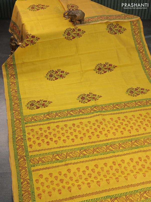 Silk cotton block printed saree yellow with butta prints and printed border