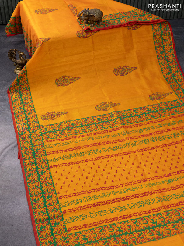 Silk cotton block printed saree orange and red with butta prints and printed border