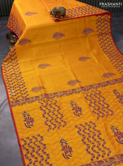 Silk cotton block printed saree orange and red with butta prints and printed border