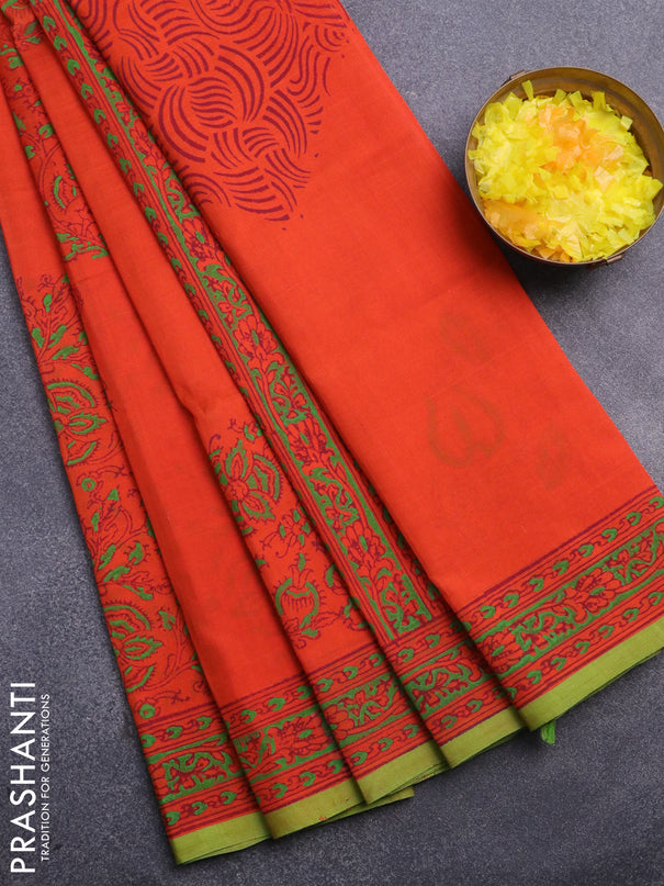 Silk cotton block printed saree orange and green with allover prints and printed border