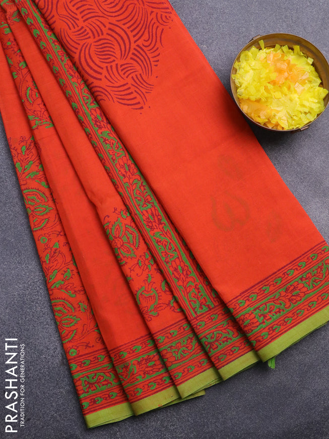 Silk cotton block printed saree orange and green with allover prints and printed border