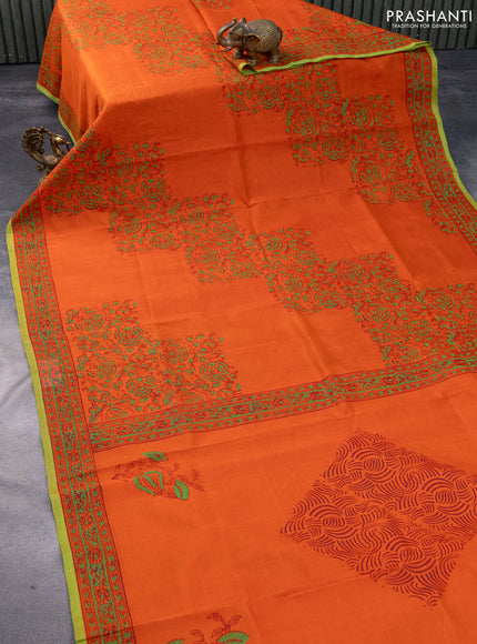 Silk cotton block printed saree orange and green with allover prints and printed border