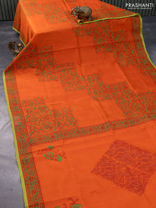 Silk cotton block printed saree orange and green with allover prints and printed border