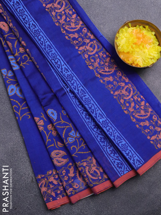 Silk cotton block printed saree blue and orange shade with allover floral prints and printed border