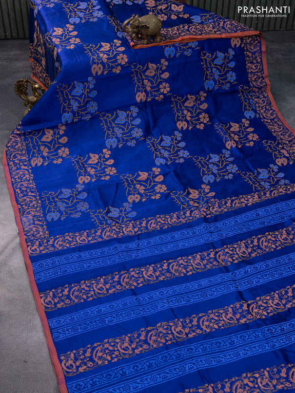 Silk cotton block printed saree blue and orange shade with allover floral prints and printed border