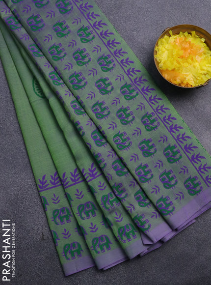 Silk cotton block printed saree dual shade of green and violet shade with butta prints and printed border