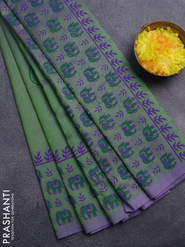 Silk cotton block printed saree dual shade of green and violet shade with butta prints and printed border