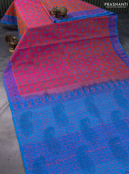 Silk cotton block printed saree dual shade of pinkish orange and blue with allover prints and printed border