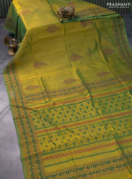 Silk cotton block printed saree dual shade of greenish yellow with butta prints and printed border