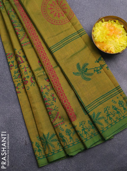 Silk cotton block printed saree dual shade of greenish yellow with allover warli prints and printed border