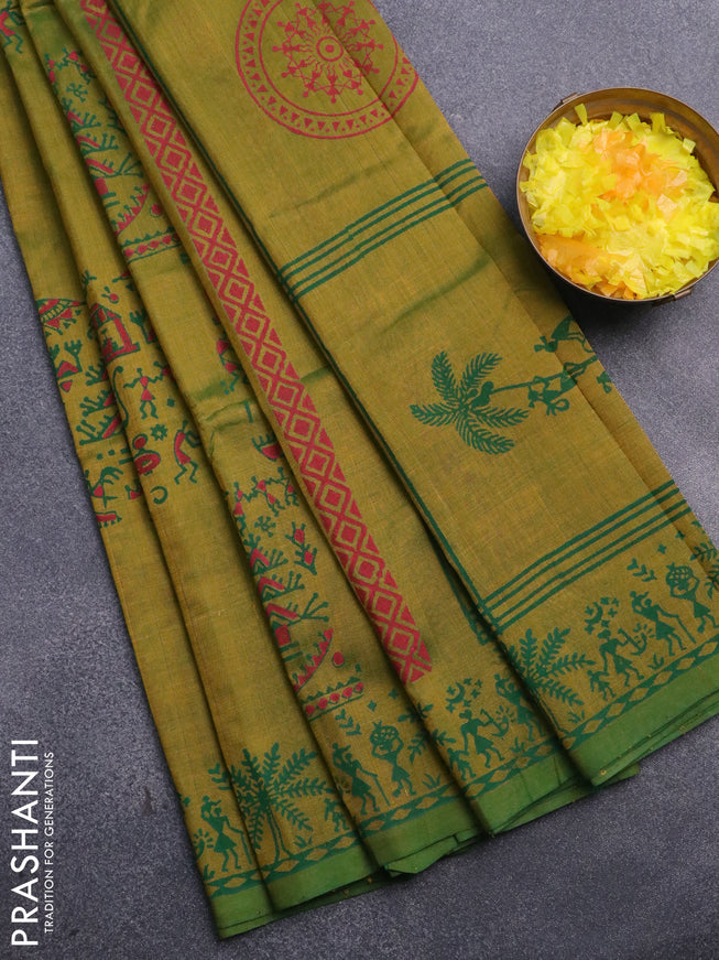 Silk cotton block printed saree dual shade of greenish yellow with allover warli prints and printed border