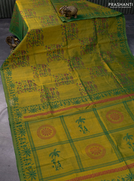 Silk cotton block printed saree dual shade of greenish yellow with allover warli prints and printed border