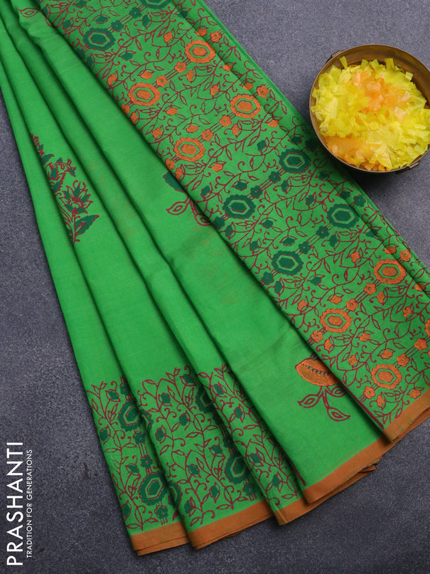 Silk cotton block printed saree light green and orange with butta prints and printed border