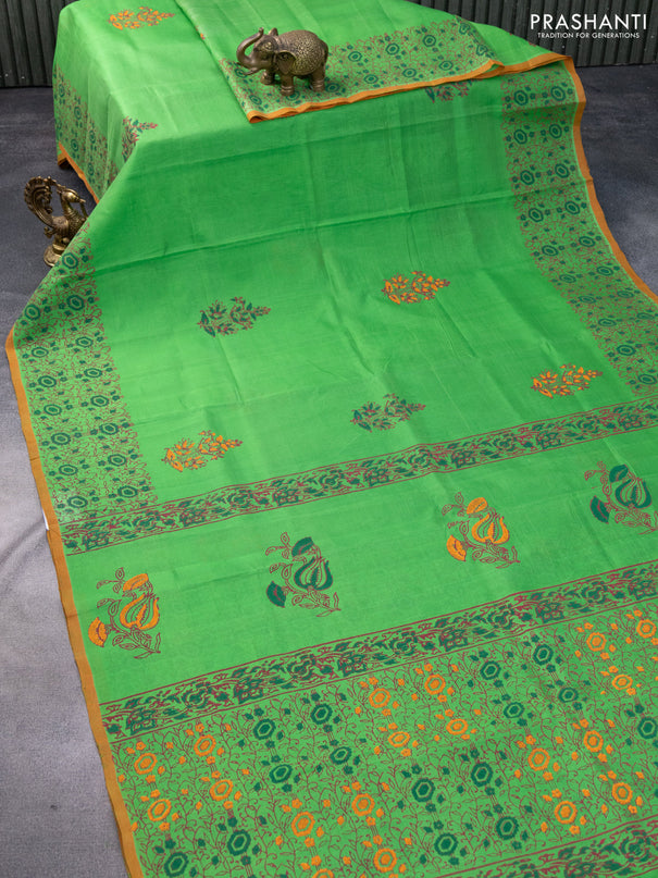 Silk cotton block printed saree light green and orange with butta prints and printed border