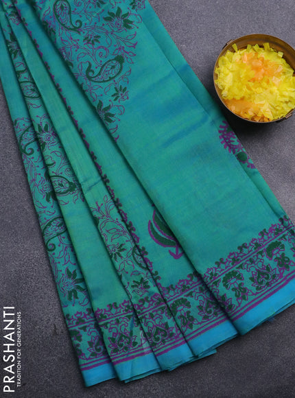 Silk cotton block printed saree dual shade of teal green with allover prints and printed border