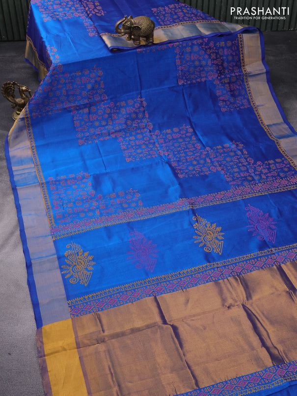 Silk cotton block printed saree cs blue with allover prints and zari woven border