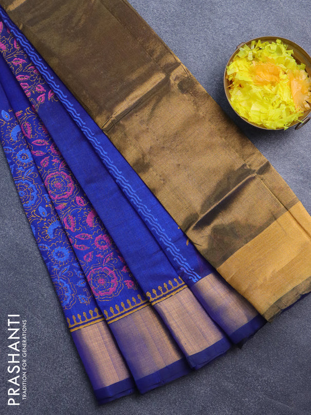 Silk cotton block printed saree blue with allover floral prints and zari woven border