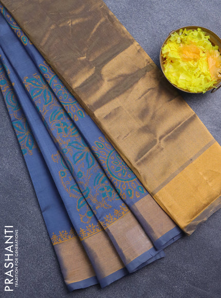 Silk cotton block printed saree grey with allover floral prints and zari woven border