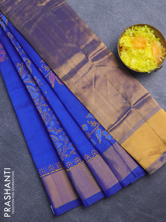 Silk cotton block printed saree blue with allover floral prints and zari woven border