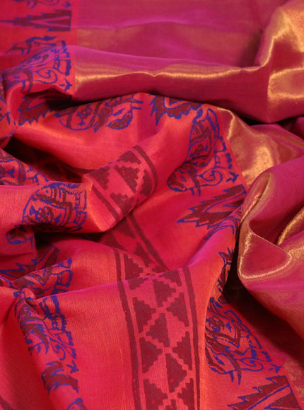 Silk cotton block printed saree dual shade of pinkish orange with butta prints and zari woven border