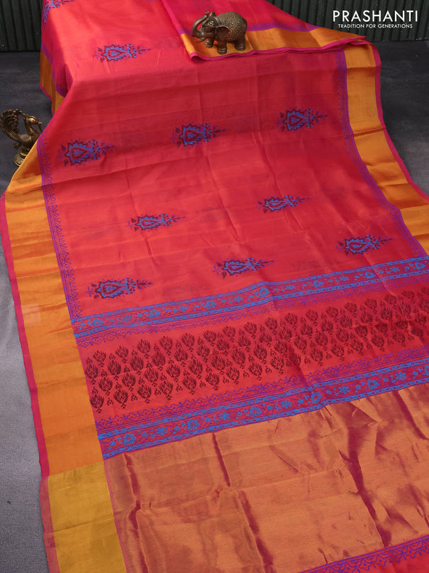 Silk cotton block printed saree dual shade of pinkish orange with butta prints and zari woven border