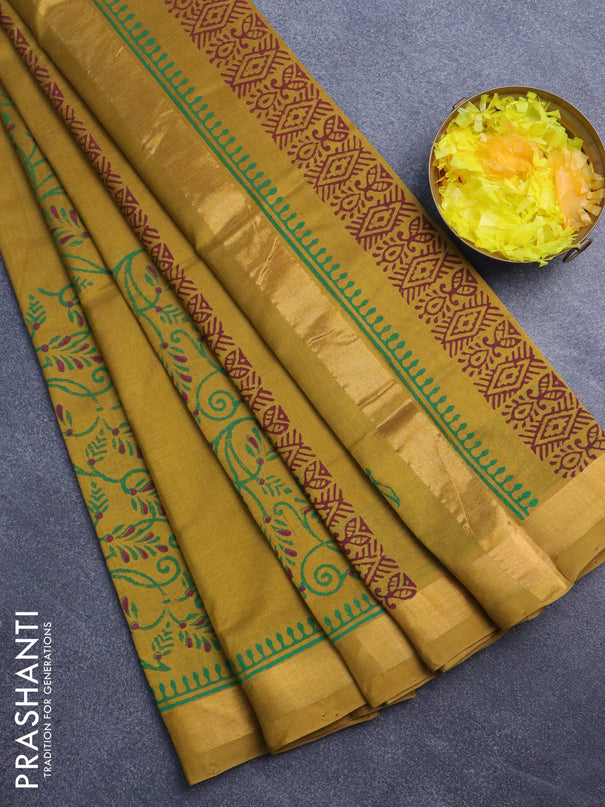 Silk cotton block printed saree mehendi green with allover prints and zari woven border