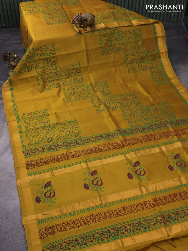 Silk cotton block printed saree mehendi green with allover prints and zari woven border