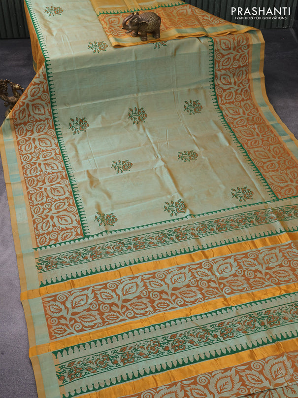 Silk cotton block printed saree dual shade of green and mustard shade with butta prints and zari woven border