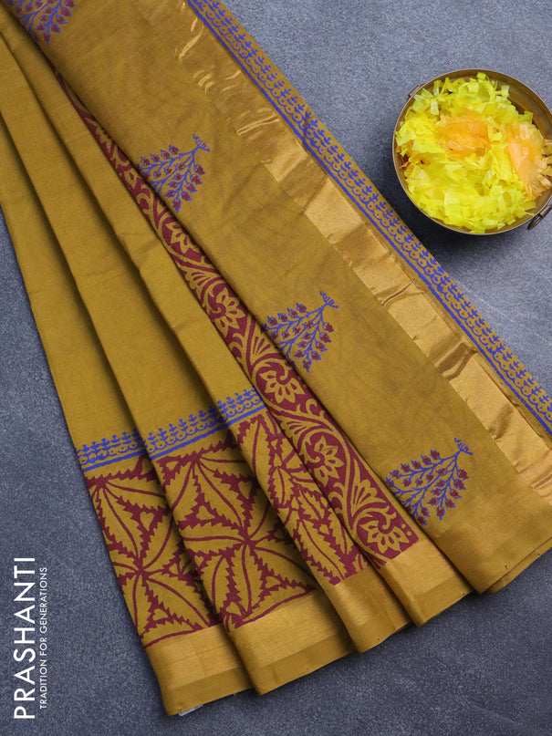 Silk cotton block printed saree dark mustard with butta prints and zari woven border