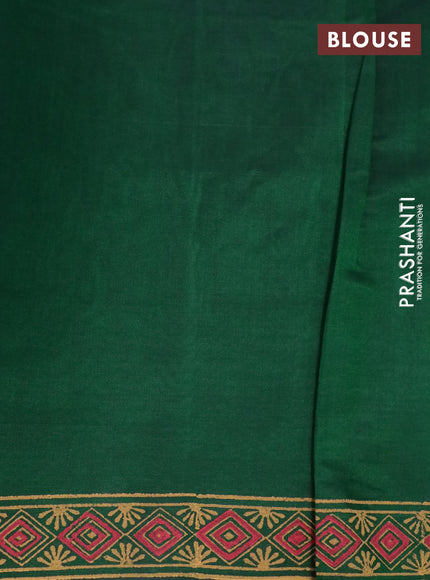 Silk cotton block printed saree green with geometric prints and piping zari woven border