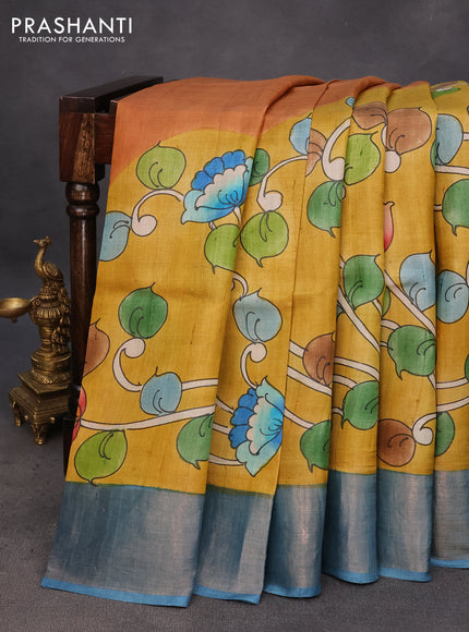 Pure tussar silk saree yellow and blue with hand painted kalamkari prints and zari woven border