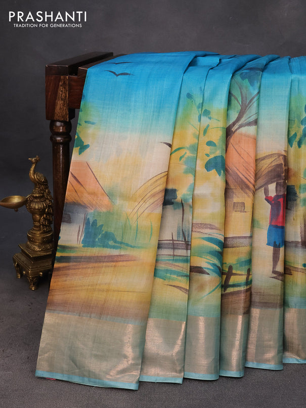 Pure tussar silk saree light blue and teal blue with hand painted prints and zari woven border