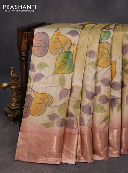 Pure tussar silk saree pastel blue and pastel brown with hand painted prints and zari woven border