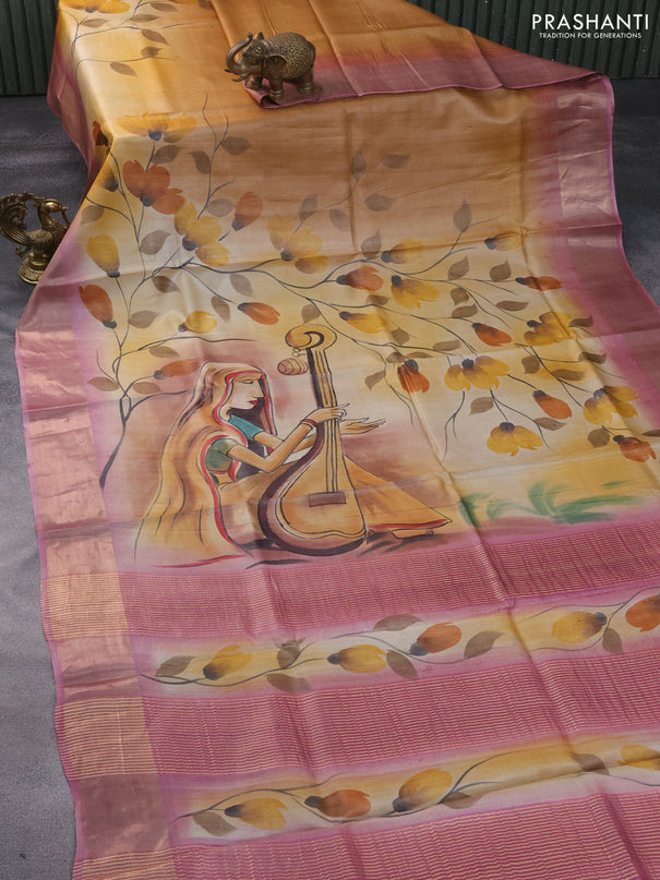 Pure tussar silk saree sandal and mauve pink with hand painted floral prints and zari woven border