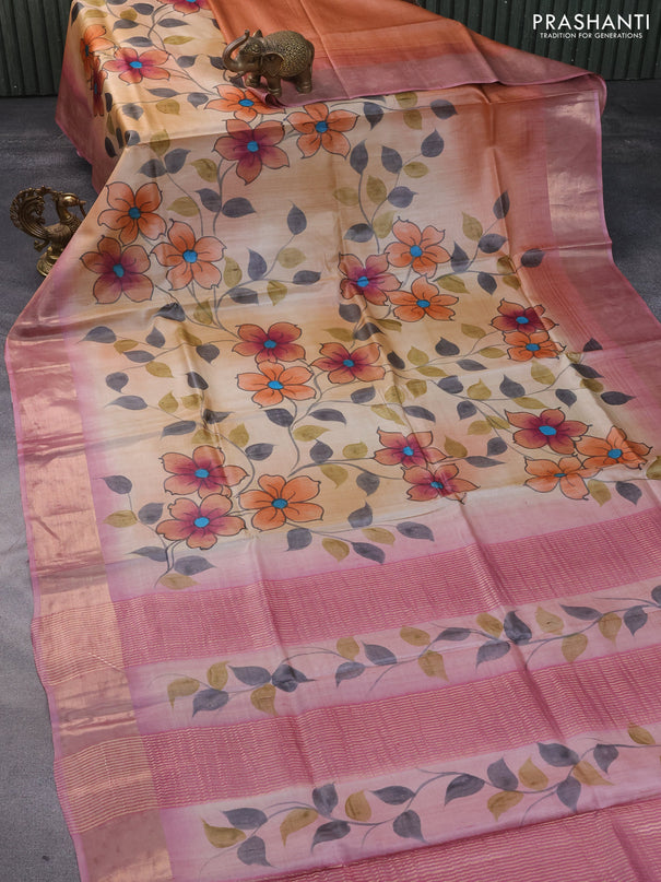 Pure tussar silk saree sandal and pastel pink with hand painted floral prints and zari woven border