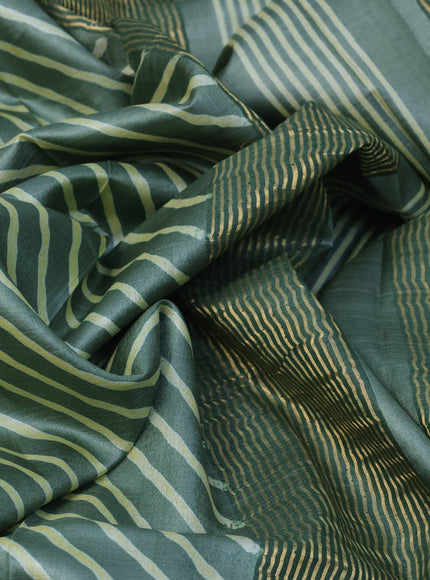 Pure tussar silk saree pastel green with allover leheriya prints and zari woven border