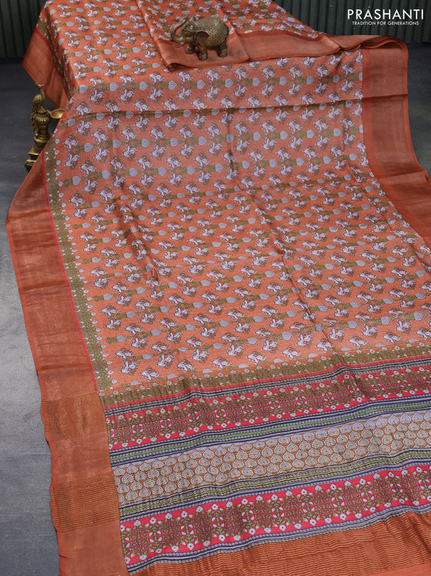 Pure tussar silk saree orange with allover elephant prints and zari woven border